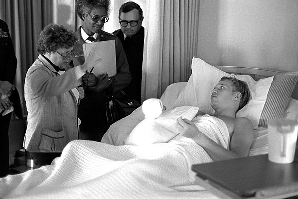 Mikulski speaking to a patient at a military hospital, 1980.