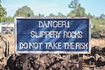 Thumbnail for File:Blue sign "Danger! Slippery rocks - Do not take the risk".jpg