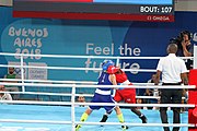 Deutsch: Boxen bei den Olympischen Jugendspielen 2018 Tag 12, 18. Oktober 2018 - Finale Fliegengewicht Mädchen – Martina La Piana (Italien, blau) schlägt Adijat Gbadamosi (Nigeria, rot) 5-0; Ringrichter ist James Beckles (Trinidad und Tobago). English: Boxing at the 2018 Summer Youth Olympics on 18 October 2018 – Girl's flyweight Gold Medal Bout - Martina La Piana (Italy, blue) beats Adijat Gbadamosi (Nigeria, red) 5-0; Referee is James Beckles (Trinidad and Tobago). Español: Boxeo en los Juegos Olímpicos Juveniles de Verano de 2018 en 18 de octubre de 2018 - Combate a medalla de oro de peso mosca para mujeres: Martina La Piana (Italia, azul) le gana a Adijat Gbadamosi (Nigeria, roja) 5-0; El árbitro es James Beckles (Trinidad y Tobago).