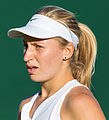 Daria Gavrilova competing in the first round of the 2015 Wimbledon Championships against Irina-Camelia Begu.