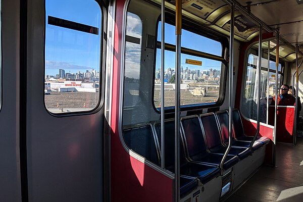 Interior of a Mark I train travelling along the Expo Line between Commercial–Broadway and Main Street–Science World station (2019)