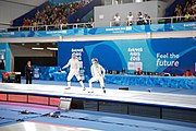 Deutsch: Fechten bei den Olympischen Jugend-Sommerspielen 2018: Tag 1, 7. Oktober 2018, Jungen, Säbel, Finale - Krisztián Rabb (HUN) - Hyun Jun (KOR) (USA) 15:13 English: Fencing at the 2018 Summer Youth Olympics at 7 October 2018 – Boys' sabre Gold medal match – Krisztián Rabb (HUN) Vs Hyun Jun (KOR) (USA) 15:13