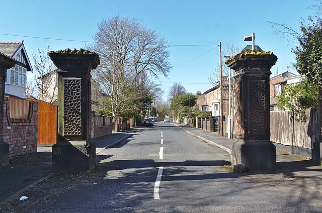Pair of rusticated stone gate piers at the entrance to Litherland Park opposite School Lane.