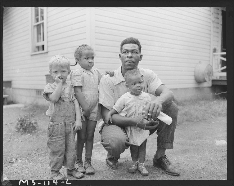 File:Gonzalla Sullivan, miner, with his two children and another child who lives in the neighborhood. Koppers Coal... - NARA - 540280.tif