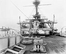 View of 'Y' turret (12 inch Mk VIII guns) and after superstructure from the quarterdeck HMS Hannibal Y turret IWM Q 039023.jpg