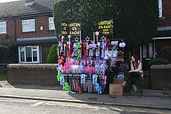 A merchandise stall outside houses along Walton Street during the 2023 instalment of Hull Fair.