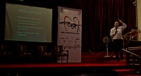 Jimmy Wales inaugurating the conference: The slide reads - Knowledge is peace India Mumbai Victor Grigas 2011-25.jpg