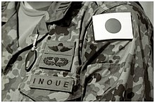 The flag of Japan badge on JSDF uniforms during the Japanese Iraq Reconstruction and Support Group JDF Uniform01a.jpg