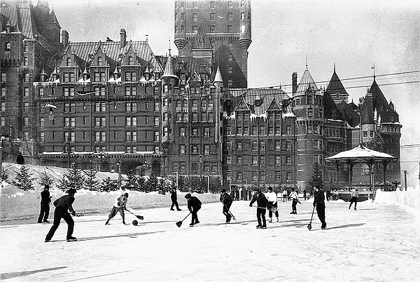 Broomball players playing on ice skates on the Terrasse Dufferin in Quebec circa 1923