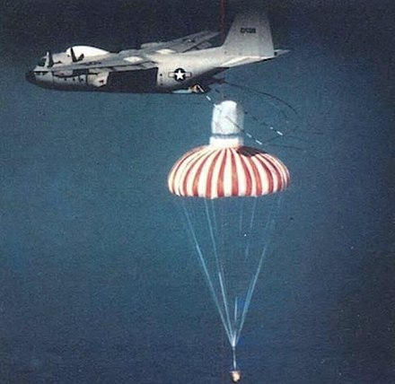 A U.S. JC-130 aircraft retrieving a reconnaissance satellite film capsule under parachute.