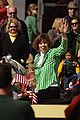 Dane County Executive Kathleen Falk waves to the crowd during the St. Patrick's Day Parade in Madison on March 15, 2009.