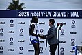 Lisa Hardeman (R) presented Nyakoat Dojiok (L) with the Lisa Hardeman Medal for best on field