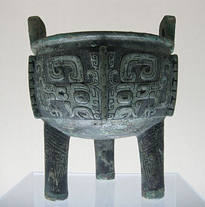 Taotie on a ding, c. 1384-1050 BC, bronze, Shanghai Museum, Shanghai, China[23]