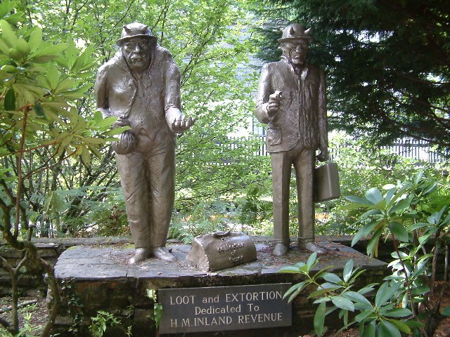 Loot and Extortion. Statues at Trago Mills, poking fun at the Inland Revenue.