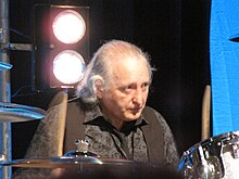 Griffin performing at a 2009 Mott the Hoople reunion show