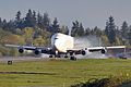 Boeing 747 LCF DreamLifter No.4 N718BA landing at Paine Field Airport, April 9, 2015.