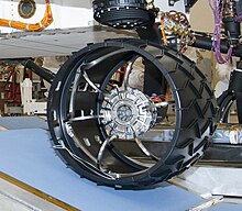 Drive wheel from the Mars Science Laboratory rover Curiosity, with integral suspension flexures. NASA MSL FLEXURE WHEEL.jpg