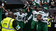 The New York Jets enter the field at the 2021 NFL London Games fixture against Atlanta Falcons at Tottenham Hotspur Stadium New York Jets (6884419).jpg