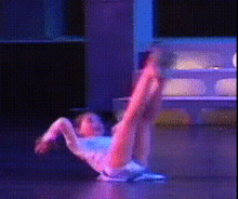 A nip-up performed during an acro dance routine NipUp.gif