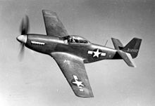 The tenth production P-51B, 43-12102, prototype for the P-51D, showing the modified rear fuselage and new canopy and windscreen North American P-51D prototype in flight SN 43-12102; Modified P-51B 061023-F-1234P-021.jpg