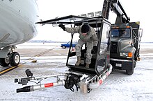 Fluid based aircraft de-icing vehicle Out of the snow, into the sky 150203-F-KS317-005.jpg