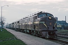 PRR EMD E8A passenger locomotive PRR E8A 5766 with WB Manhatten Limited + Golden Triangle Englewood, IL on April 21, 1865 (24764647162).jpg