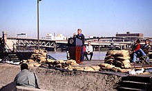 U.S. President Bill Clinton speaking in Portland, Oregon while touring flood damaged areas. Pacific Northwest Flood of 1996 (24195344733).jpg