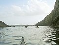 Paddling out of a cave below the Heights of Ramnageo - geograph.org.uk - 1524136.jpg