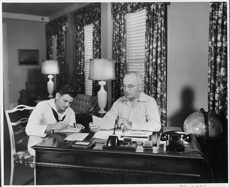 File:Photograph of President Truman dictating to Navy Yeoman Emil Kesselman at his desk in the "Little White House," his... - NARA - 200522.jpg
