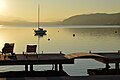 English: Sailing yacht and sunset on the Lake Woerth in front of My Lake`s Deutsch: Segel-Yacht und Sonnenuntergang auf dem Wörther See vor Mein Lakes