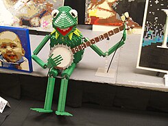 Kermit statue, BrickCon, 2013 Rainbow Connection Kermit the Frog with Banjo (10229136905).jpg