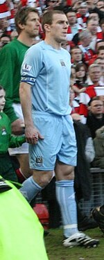 Dunne captaining Manchester City in 2008 against Manchester United in a local derby. Richard dunne2.jpg