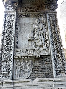 Relief på Arco degli Argentari som visar Caracalla. Geta har blivit utraderad.