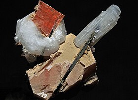 Crystals of serandite, natrolite, analcime, and aegirine from Mont Saint-Hilaire, Quebec, Canada Serandite, natrolite, analcime, aegirine 300-4-2112.JPG