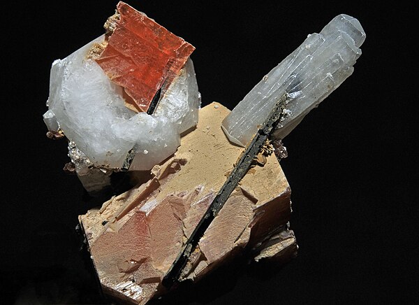 Crystals of serandite, natrolite, analcime, and aegirine from Mont Saint-Hilaire, Quebec, Canada