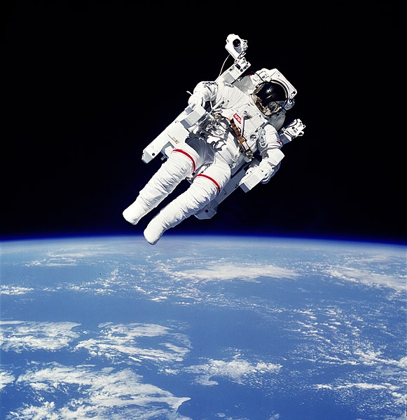 NASA astronaut Bruce McCandless II using a Manned Maneuvering Unit outside Space Shuttle Challenger on shuttle mission STS-41-B in 1984