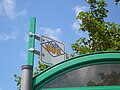 The bus stop flag at Victoria Road, Sandown, Isle of Wight, in June 2011. At the time it was served by Wightbus buses on route 22. From September 2011, the Isle of Wight Council axed all Wightbus operations and a replacement service is now run by Southern Vectis as service 24 run with volunteer drivers.