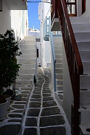 File:Stairs to houses on a street, Chora of Mykonos, 224488.jpg