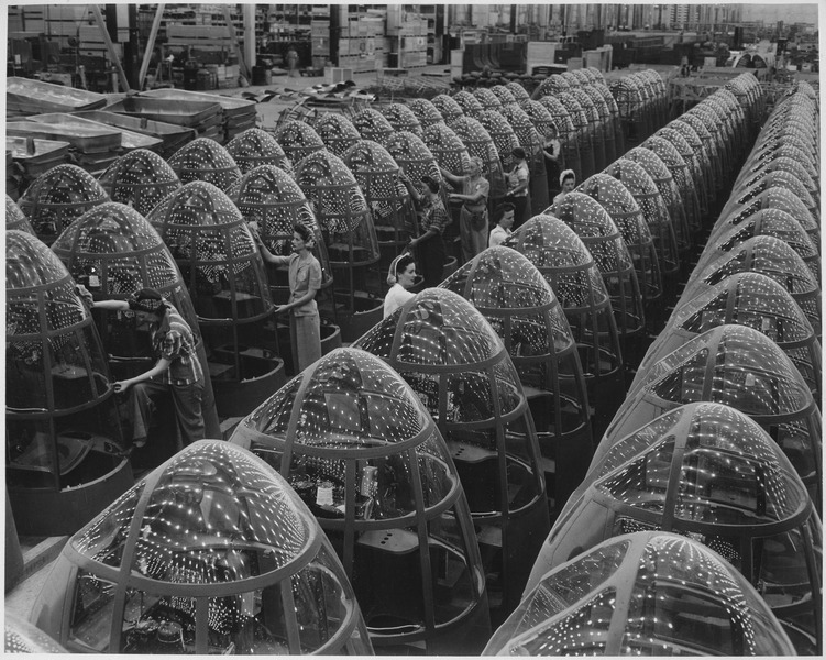 File:Stars over Berlin and Tokyo will soon replace these factory lights reflected in the noses of planes at Douglas... - NARA - 535578.tif