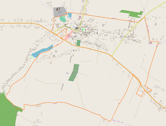 Mapa konturowa Stopnicy, u góry znajduje się punkt z opisem „Kościół Świętych Apostołów Piotra i Pawła w Stopnicy”