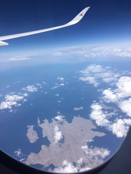 The Strait of Hormuz as seen from an airliner at 35,000 feet. Musandam is in the foreground. [verification needed]