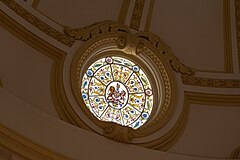 A stained glass window set into the inner dome above the Supreme Court Library, within the Supreme Court of Victoria building.