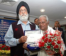 Nikhil Nandy (in right), member of the Eastern Railway's 1958 Calcutta Football League winning team. The Minister of State (Independent Charge) for Youth Affairs & Sports, Dr. M.S. Gill felicitated the Indian Football Heroes, who reached the semi - finals of Melbourne Olympics, 1956, in New Delhi on February 23, 2009 (1).jpg