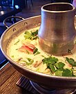 Tom kha kai at a restaurant.jpg