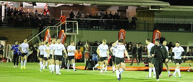 The Toronto Wolfpack taking the field against the London Broncos in the Challenge Cup at the Trailfinders Sports Ground in Ealing in March 2017