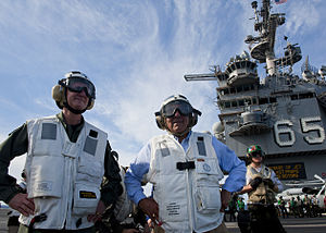 US Navy 120121-N-FI736-197 Secretary of Defense Leon E. Panetta, right, and Rear Adm. Walter E. Carter, commander of Carrier Strike Group (CSG) 12.jpg