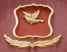 Wappen Lörrachs an der Fassade des Pfarrhauses