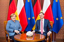 Merkel with the Prime Minister of Poland Mateusz Morawiecki in Warsaw, March 2018 Wizyta kanclerz Angeli Merkel (40862113012).jpg