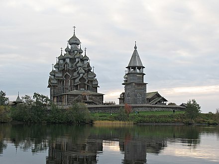 The churches of Kizhi, Russia are among a handful of World Heritage Sites built entirely of wood, without metal joints. See Kizhi Pogost for more details.