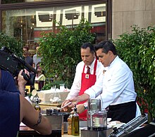 Holt hosting Weekend Today in 2005, cooking live on the streets of New York City 2005 Lester Holt on Weekend Today.jpg